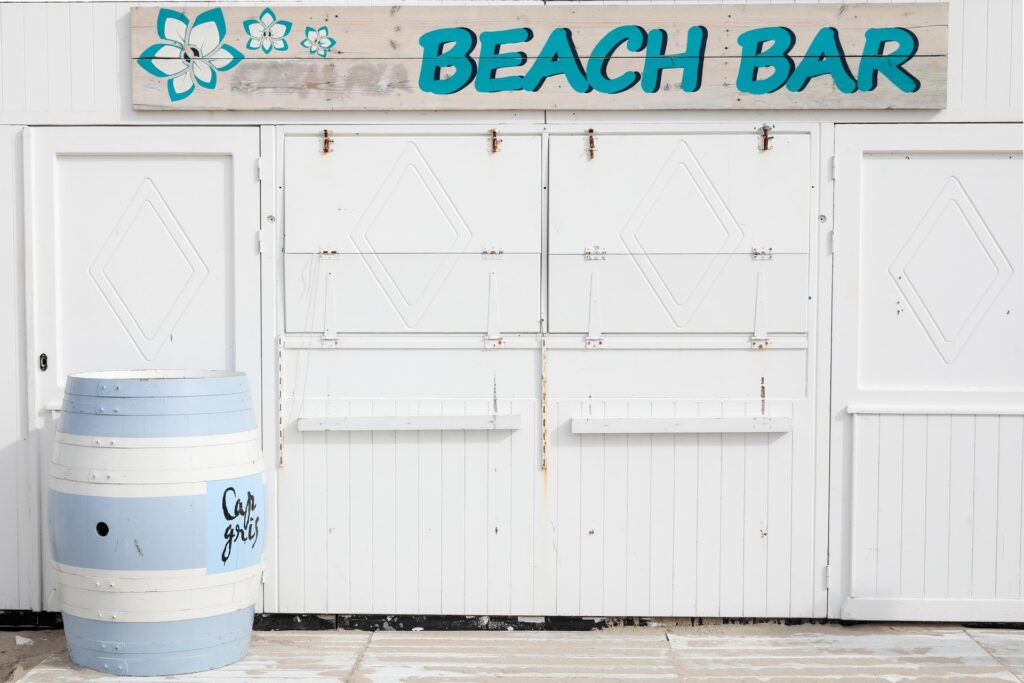 Image by CapeCom from Pixabay gulf coast beach bar sign, be coastal, turquoise and white