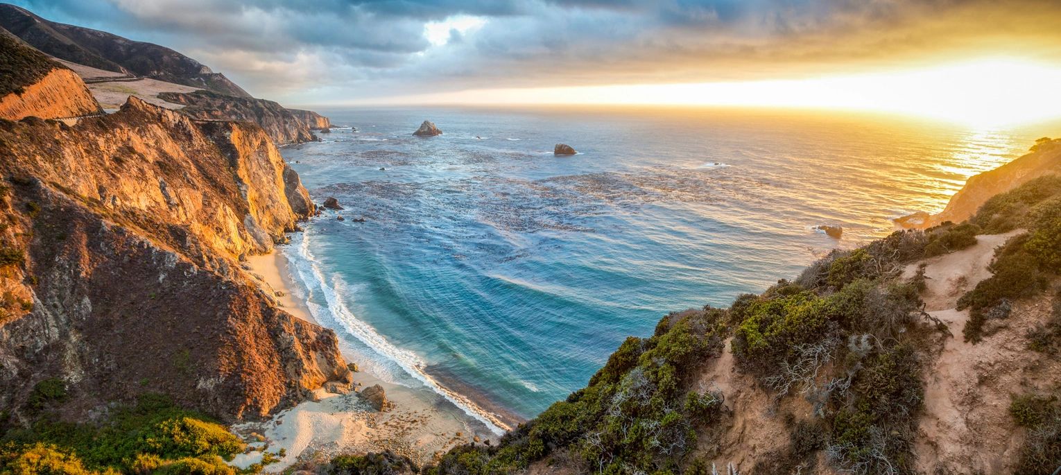 beach with cliffs and blue water, be coastal, coastal happenings