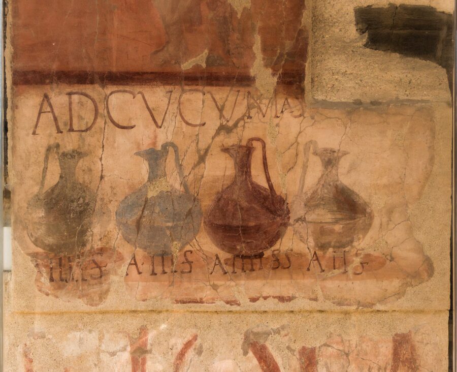 Roman stone tablet depicting wine jugs, colorful, invented wine